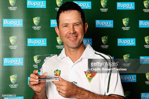 Ricky Ponting poses with the award for Sheffield Shield player of the year during the State Cricket Awards at Blundstone Arena on March 20, 2013 in...