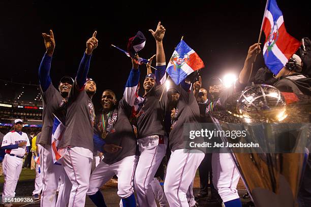 Team Dominican Republic celebrates on the mound after winning the 2013 World Baseball Classic Championship Game against Team Puerto Rico on Tuesday,...