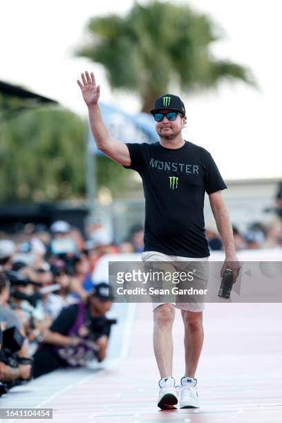 Cup Series driver, Kurt Busch walks onstage during driver intros after the announcement of his retirement prior to the NASCAR Cup Series Coke Zero...