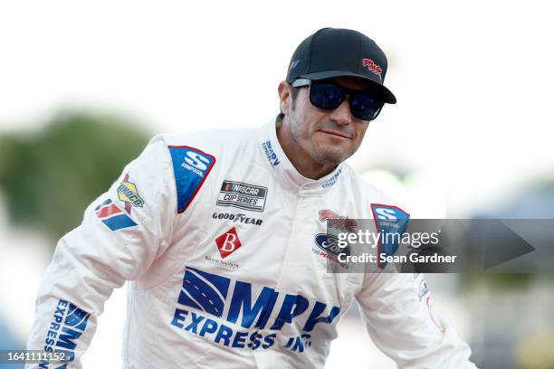 Yeley, driver of the Biohaven/Jacob Co. Ford, walks onstage during driver intros prior to the NASCAR Cup Series Coke Zero Sugar 400 at Daytona...