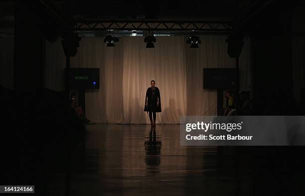 Model Sophie Lowe showcases designs by MIMCO on the runway at the MIMCO show during L'Oreal Melbourne Fashion Festival on March 20, 2013 in...