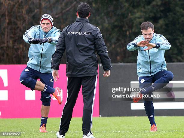 German striker Mario Gomez and Germany's defender Heiko Westermann attend a training session of the German national football team prior to the World...