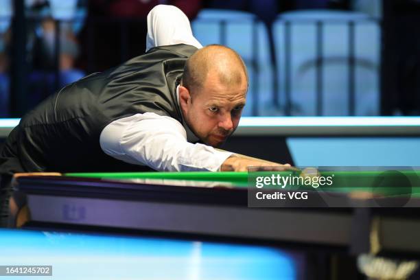 Barry Hawkins of England plays a shot in the Semifinal match against Mark Selby of England on day 5 of Snooker European Masters 2023 at Kia Metropol...