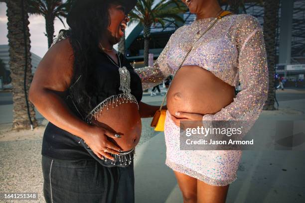 Inglewood, CA From Left - Deniquia B. And Caira M. And their baby bumps pose for a portrait before entering Beyoncé's Renaissance World Tour on...