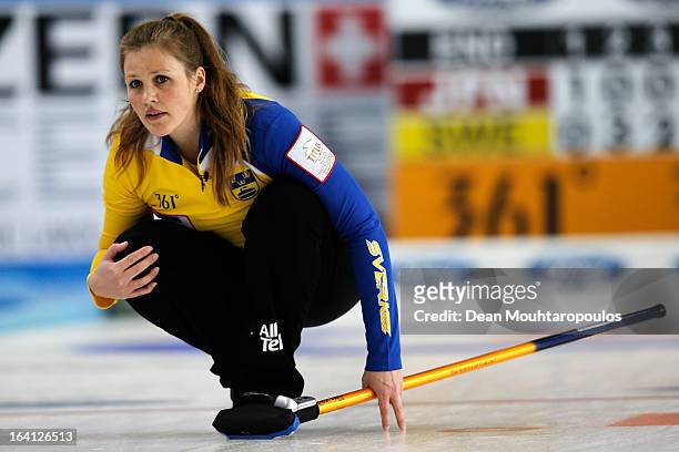 Christina Bertrup of Sweden looks on after she throws a stone in the match between Japan and Sweden on Day 5 of the Titlis Glacier Mountain World...