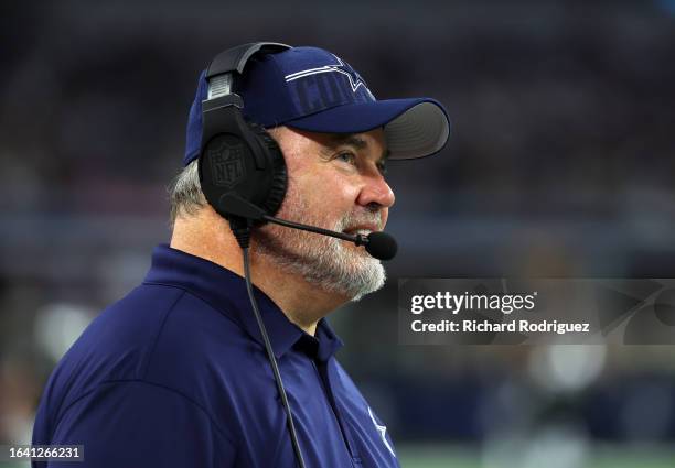 Mike McCarthy head coach of the Dallas Cowboys watches the game from the sidelines against the Las Vegas Raiders in a preseason game at AT&T Stadium...