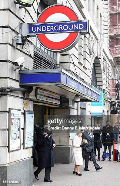 Queen Elizabeth II makes an official visit to Baker Street Underground Station on March 20, 2013 in London, England.