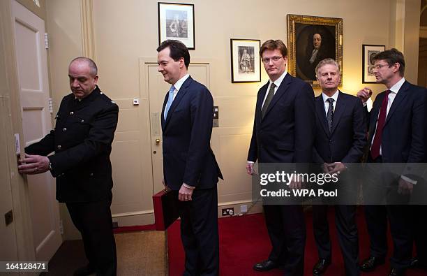 Chancellor of the Exchequer George Osborne and his treasury, team Chief Secretary to the Treasury Danny Alexander, Commercial Secretary to the...