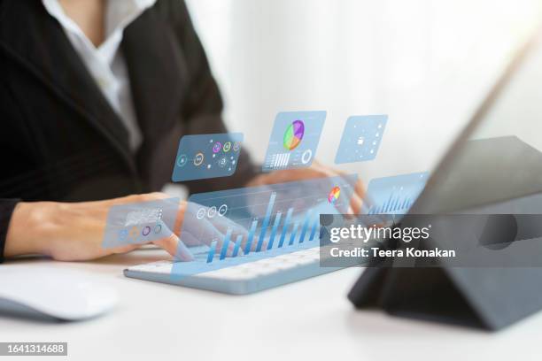 collaborative corporate finance analysis businesspeople strategizing on monitor graph dashboard - marketing digital fotografías e imágenes de stock