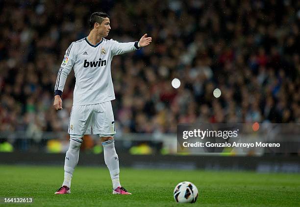 Cristiano Ronaldo of Real Madrid CF gives instructions to his team-mates before taking a free kick during the La Liga match between Real Madrid CF...