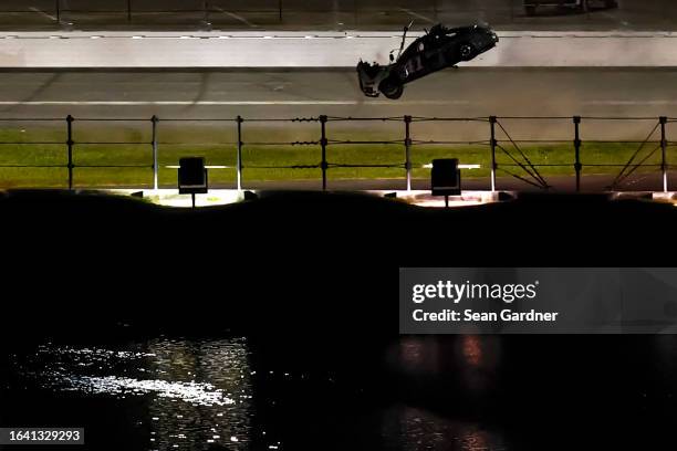 Ryan Preece, driver of the RaceChoice.com Ford, flips after an on-track incident during the NASCAR Cup Series Coke Zero Sugar 400 at Daytona...