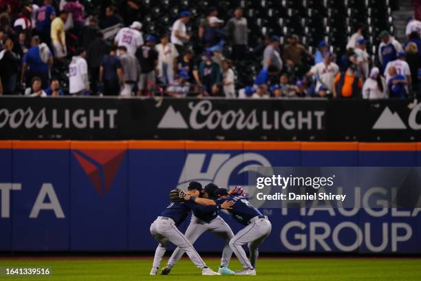 Seattle Mariners players celebrate winning after the game between the Seattle Mariners and the New York Mets at Citi Field on Saturday, September 2,...