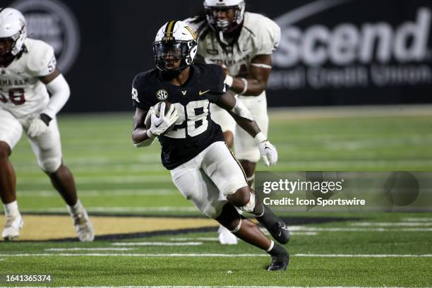 Vanderbilt Commodores running back Sedrick Alexander carries the ball during the game between the Vanderbilt Commodores and the Alabama A&M Bulldogs...