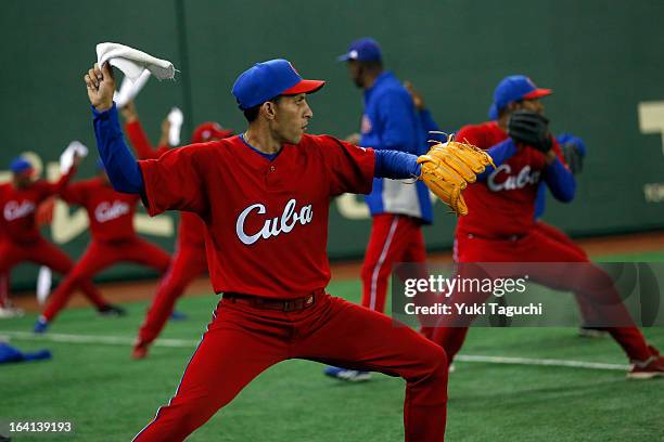 Yander Guevara of Team Cuba practices pitching drills during the 2013 World Baseball Classic workout day at the Tokyo Dome on Thursday, March 7, 2013...