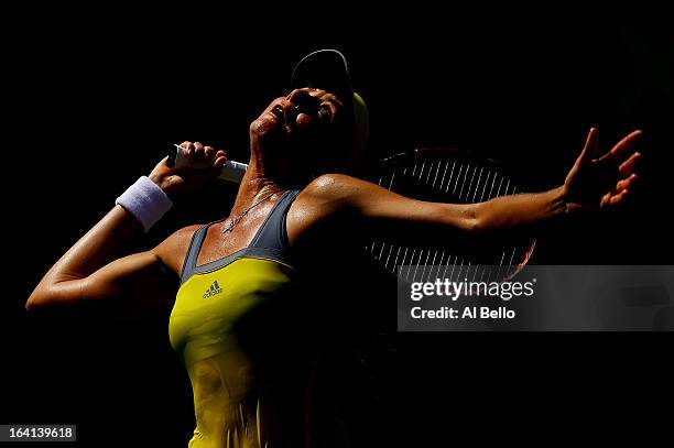 Daniela Hantuchova of Slovakia serves a shot to Tsvetana Pironkova of Bulgaria during Day 3 of the Sony Open at the Crandon Park Tennis Center on...