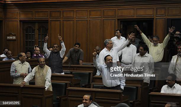 Opposition leader Vijay Kumar Malhotra and others reacting to the budget for the year 2013-14 at Old Secretariat on March 20, 2013 in New Delhi,...