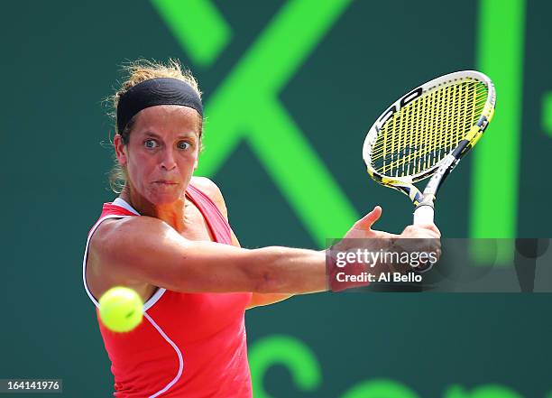 Lourdes Dominguez Lino of Spain returns a shot against Svetlana Kuznetsova of Russia Lourdes Dominguez Lino of Spain during Day 3 of the Sony Open at...