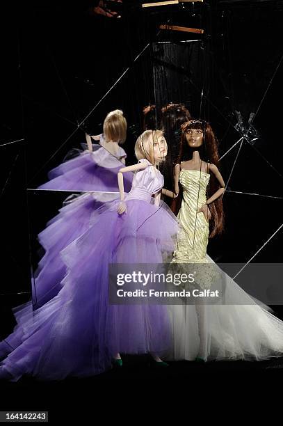 The fashion dolls walk the runway during FH by Fause Haten - Sao Paulo Fashion Week Summer 2013/2014 on March 20, 2013 in Sao Paulo, Brazil.