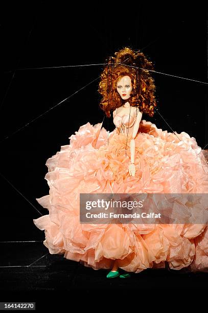 The fashion doll appears on the runway during FH by Fause Haten - Sao Paulo Fashion Week Summer 2013/2014 on March 20, 2013 in Sao Paulo, Brazil.