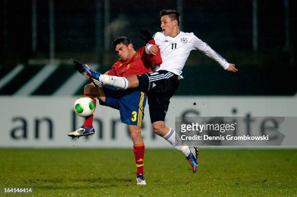 Salvador Ruiz of Spain is challenged by Fabian Schnellhardt of Germany during the International Friendly match between U19 Germany and U19 Spain on...