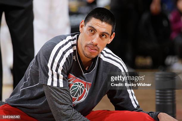 Gustavo Ayon of the Milwaukee Bucks stretches out prior to the game against the Golden State Warriors on March 9, 2013 at Oracle Arena in Oakland,...