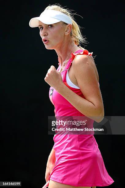 Olga Govortsova of Belarus celebrates a point against Melinda Czink of Hungary during the Sony Open at Crandon Park Tennis Center on March 20, 2013...