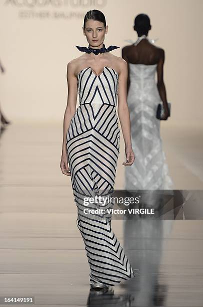 Model walks the runway during the Acquastudio show by Esther Bauman during Sao Paulo Fashion Week Spring Summer 2013/2014 on March 19, 2013 in S?o...