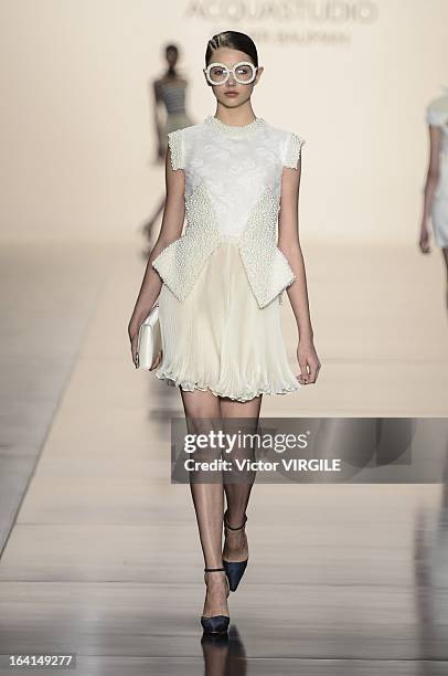 Model walks the runway during the Acquastudio show by Esther Bauman during Sao Paulo Fashion Week Spring Summer 2013/2014 on March 19, 2013 in S?o...