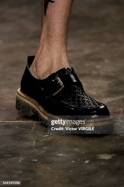 Model walks the runway at the Ellus fashion show during Sao Paulo Fashion Week Spring Summer 2013/2014 on March 19, 2013 in Sao Paulo, Brazil.