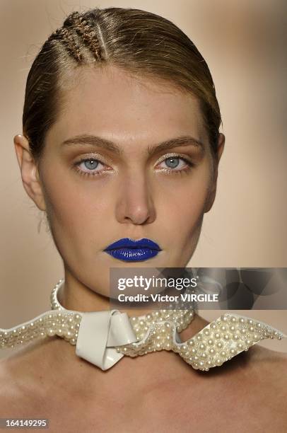 Model walks the runway during the Acquastudio show by Esther Bauman during Sao Paulo Fashion Week Spring Summer 2013/2014 on March 19, 2013 in S?o...