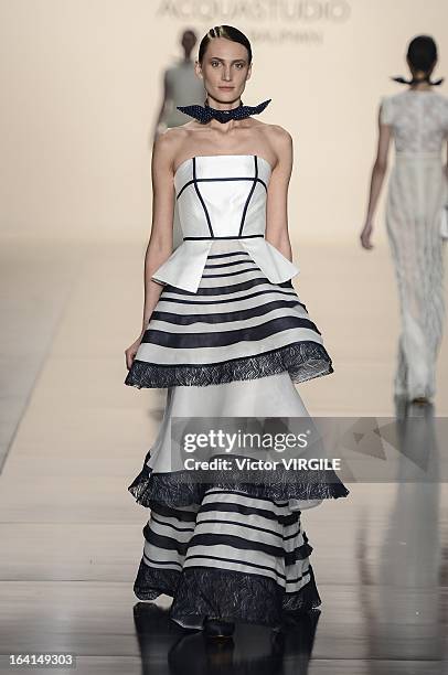 Model walks the runway during the Acquastudio show by Esther Bauman during Sao Paulo Fashion Week Spring Summer 2013/2014 on March 19, 2013 in S?o...