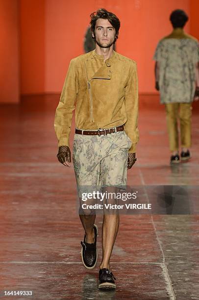 Model walks the runway at the Ellus fashion show during Sao Paulo Fashion Week Spring Summer 2013/2014 on March 19, 2013 in Sao Paulo, Brazil.