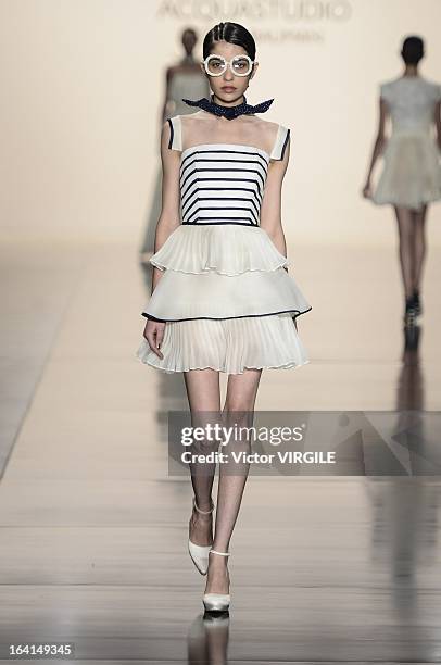 Model walks the runway during the Acquastudio show by Esther Bauman during Sao Paulo Fashion Week Spring Summer 2013/2014 on March 19, 2013 in S?o...