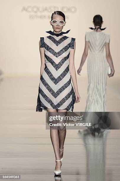 Model walks the runway during the Acquastudio show by Esther Bauman during Sao Paulo Fashion Week Spring Summer 2013/2014 on March 19, 2013 in S?o...