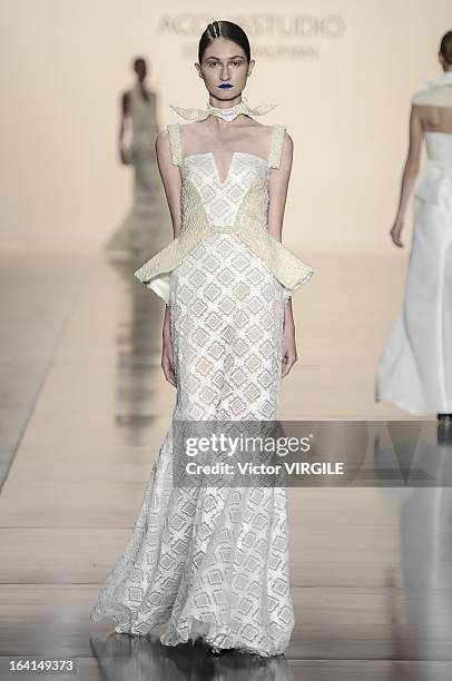 Model walks the runway during the Acquastudio show by Esther Bauman during Sao Paulo Fashion Week Spring Summer 2013/2014 on March 19, 2013 in S?o...