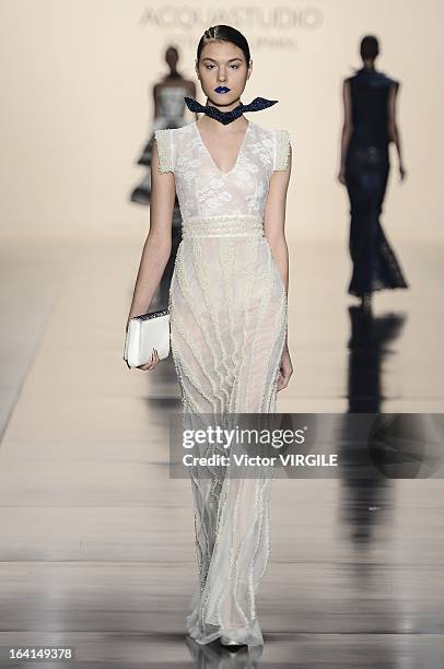 Model walks the runway during the Acquastudio show by Esther Bauman during Sao Paulo Fashion Week Spring Summer 2013/2014 on March 19, 2013 in S?o...