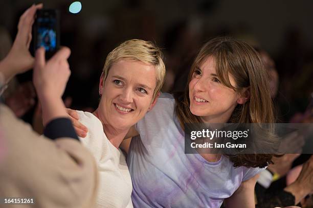 Jools Oliver enjoys the atmosphere during the Global Kids Fashion Week SS13 public show in aid of Kids Company at The Freemason's Hall on March 20,...