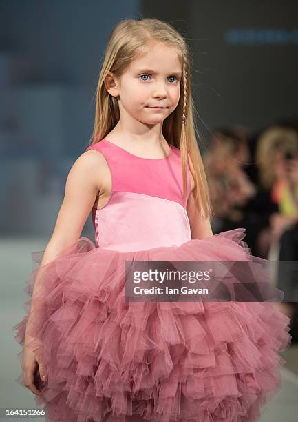 Model wearing Mischka Aoki Spring/Summer '13 walks the runway at the Global Kids Fashion Week SS13 public show in aid of Kids Company at The...