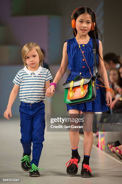 Model wearing Kickle by AlexandAlexa Spring/Summer '13 walks the runway at the Global Kids Fashion Week SS13 public show in aid of Kids Company at...