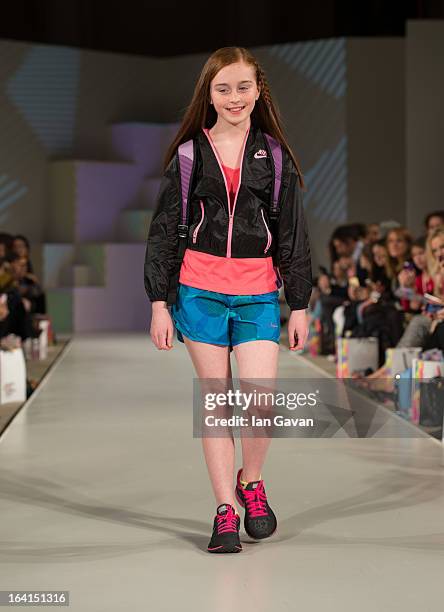 Model wearing Nike Spring/Summer '13 walks the runway at the Global Kids Fashion Week SS13 public show in aid of Kids Company at The Freemason's Hall...