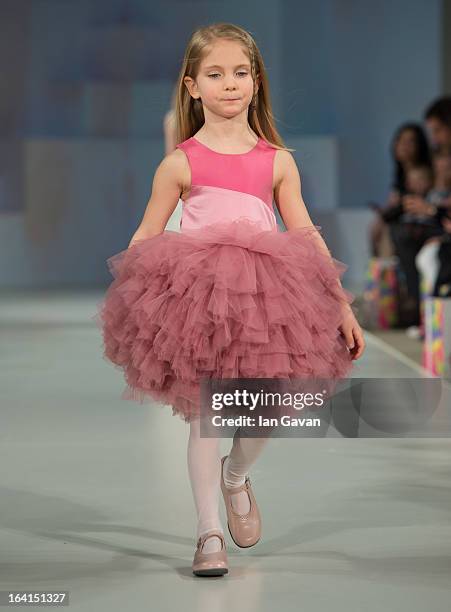 Model wearing Mischka Aoki Spring/Summer '13 walks the runway at the Global Kids Fashion Week SS13 public show in aid of Kids Company at The...