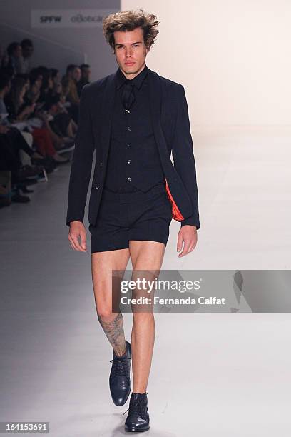 Model walks the runway during Joao Pimenta - Sao Paulo Fashion Week Summer 2013/2014 on March 20, 2013 in Sao Paulo, Brazil.