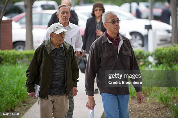 Shareholders arrive for the Hewlett-Packard Co. Annual meeting in Mountain View, California, U.S., on Wednesday, March 20, 2013. Hewlett-Packard Co....