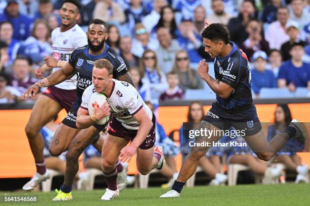 Daly Cherry-Evans of the Manly Sea Eagles scores a try during the round 26 NRL match between Canterbury Bulldogs and Manly Sea Eagles at Accor...