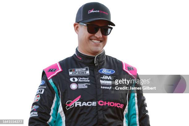 Ryan Preece, driver of the RaceChoice.com Ford, walks onstage during driver intros prior to the NASCAR Cup Series Coke Zero Sugar 400 at Daytona...