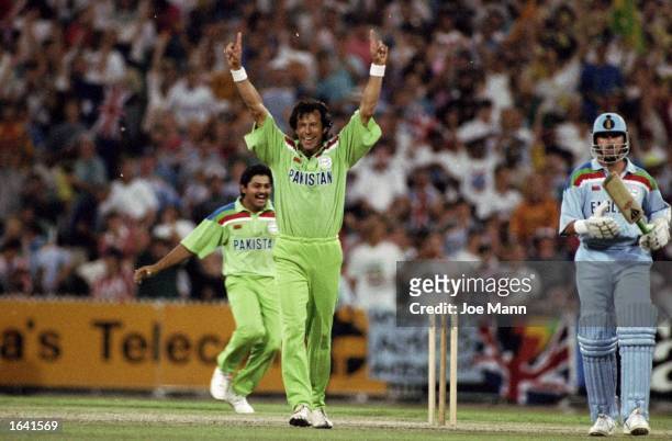 Imran Khan of Pakistan celebrates after taking the wicket of Richard Illingworth of England to win the World Cup Final at the Melbourne Cricket...