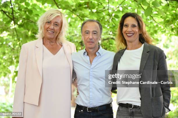 Sylvie Hofmann, Director Sebastien Lifshitz and a guest attend the 'Madame Hofmann' Photocall during Day Five of the 16th Angouleme French-Speaking...