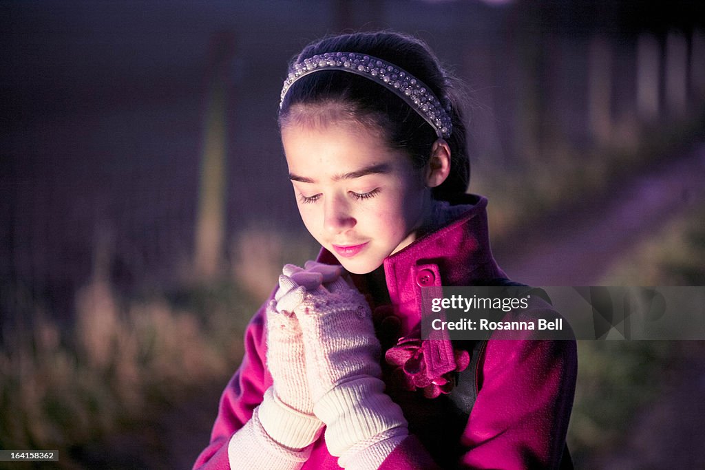 Portrait Of Girl At Night Keeping Warm High-Res Stock Photo - Getty Images