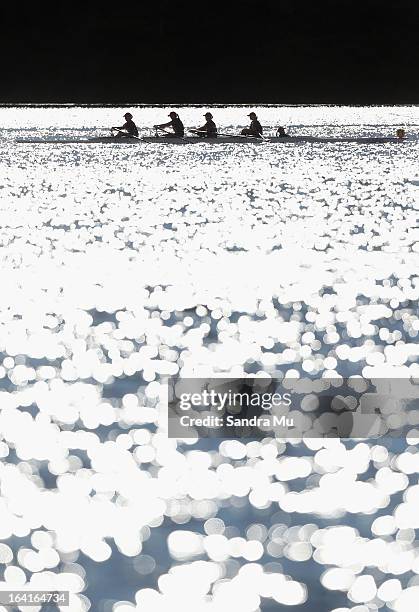 Rowers make their way to the start line during day four of the Maadi Cup at Lake Karapiro on March 21, 2013 in Cambridge, New Zealand.