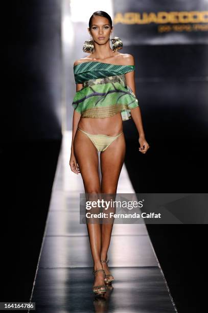 A model walks the runway during Agua de Coco - Sao Paulo Fashion Week Summer 2013/2014 on March 20, 2013 in Sao Paulo, Brazil.